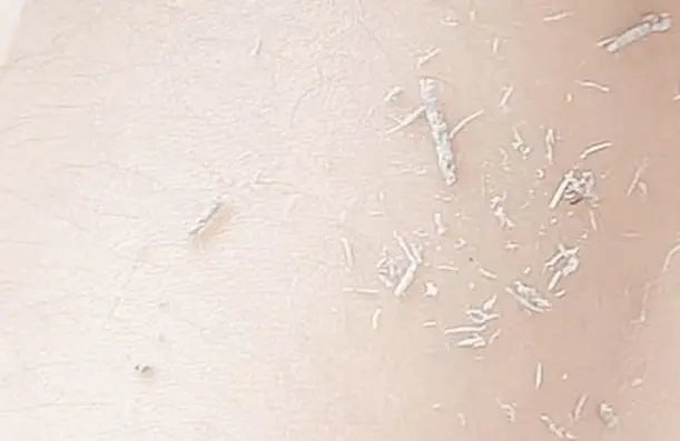 1+1 Gratis | Antibakterielles Peeling-Duschhandtuch mit Bambuskohle Zorenza